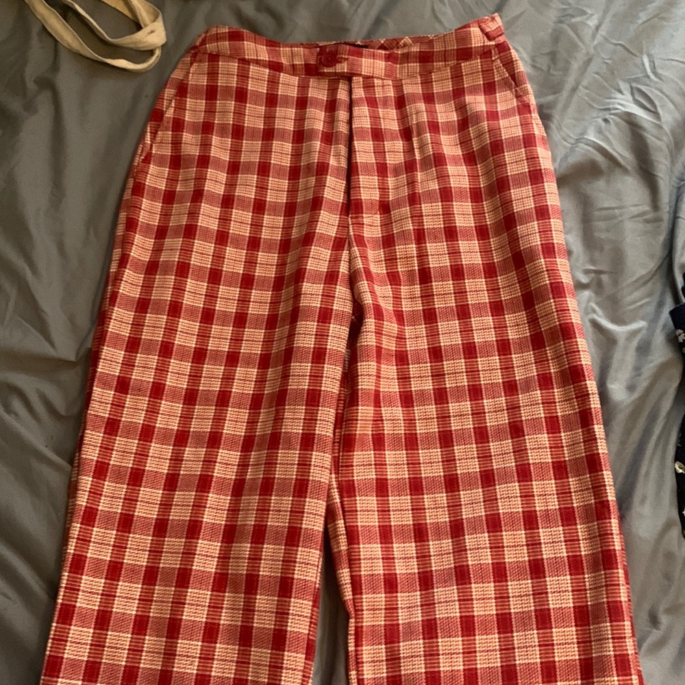 These are red plaid pants from brandy mellvile that flare at the bottom